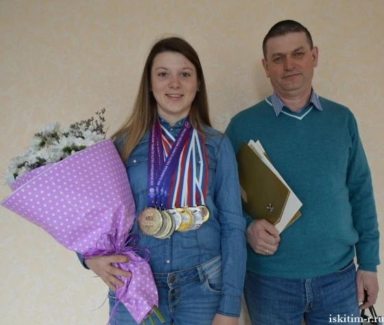 Лыжница Елена Кучева и ее тренер Владимир Краснов